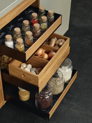 Custom kitchen drawer with spice rack and storage compartments in high-end European cabinetry