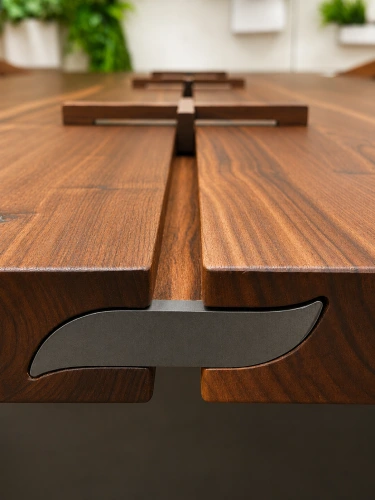 Details of TEAM 7 Echt.Zeit solid wood dining table in walnut at ARTEZIA showroom