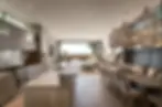 Custom TM Italia open kitchen design with seamless integration into living room layout