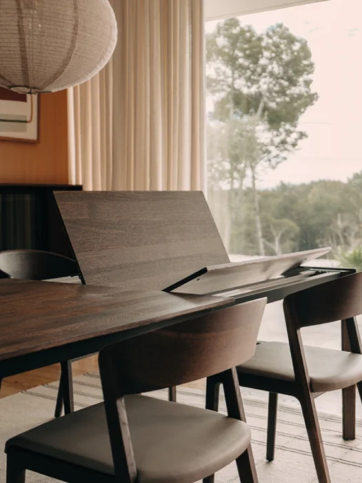 Modern dining room table that extends by TEAM 7 Tak with clean minimalist design