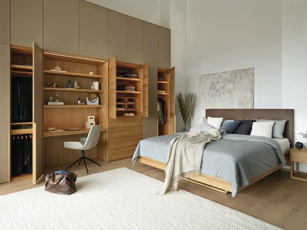 TEAM 7 Lunetto bed with a floor-to-ceiling solid wood wardrobe
