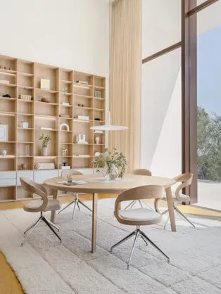TEAM 7miró table solid wood dining table and chairs in bright modern home