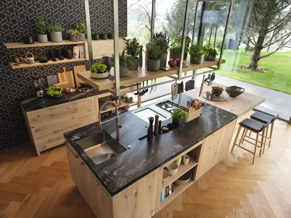 Biophilic kitchen ideas showing natural wood surfaces, indoor plants, and nature-inspired details.