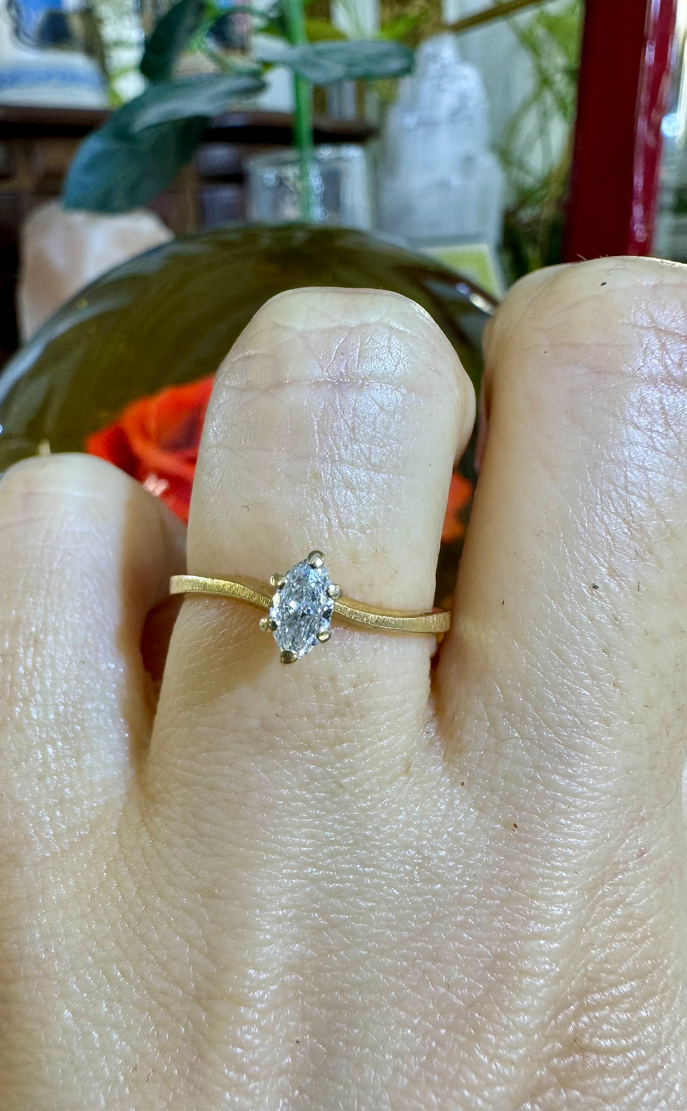 Thumbnail: Dainty 14kt Yellow Gold Marquise Shape Diamond Wavy Solitaire Ring