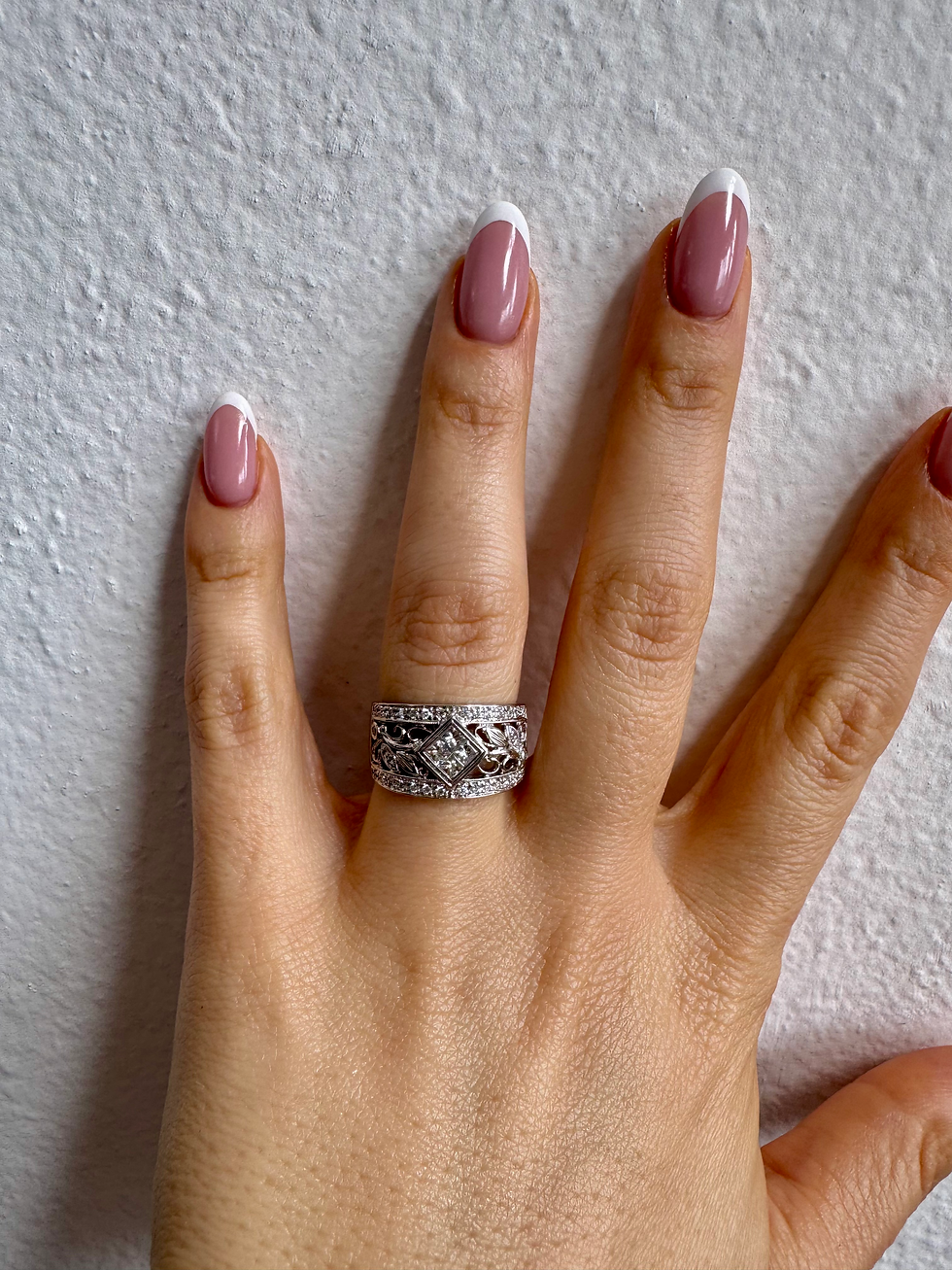Thumbnail: Vintage Style 14kt White Gold Invisible Set Princess Cut Diamond Band