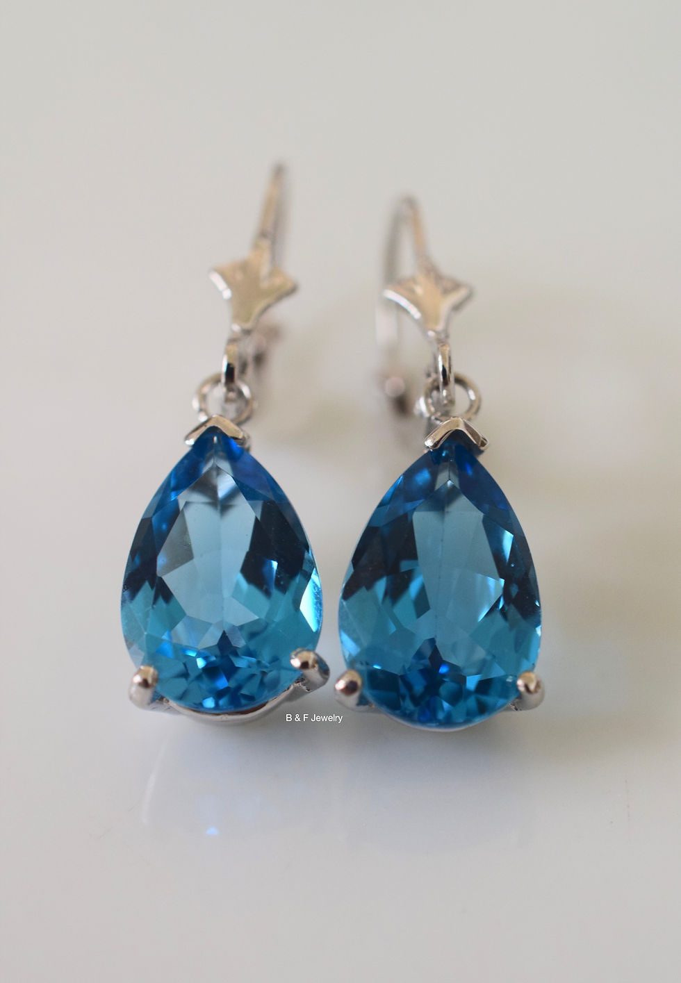 Thumbnail: 14kt White Gold Lever Back Pear Shape London Blue Topaz Earrings