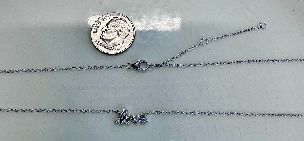 Thumbnail: Extra Small 14kt Gold Diamond "Love" Necklace