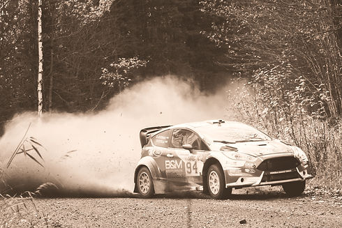 red hatchback on rally trail_edited_edited.jpg