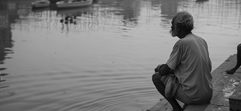 man-enjoying-peaceful-moment-by-ganges-river-varanasi-india_edited.jpg
