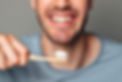 male patient with a toothbrush