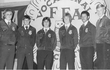 Six NC FFA state officers from the 1970s in jackets