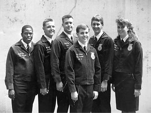 Six NC FFA state officers from the 1990s stand together.