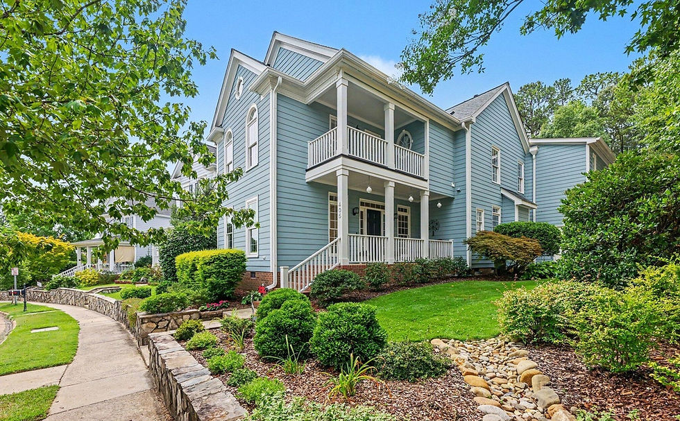 Carpenter Village home with a wrap-around front porch in West Cary NC