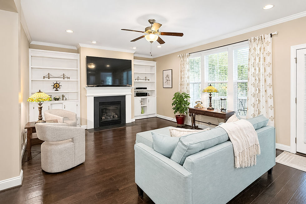 Family room with custom built-in bookshelves and gas fireplace
