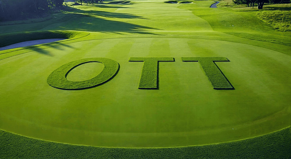 "OTT" mowed into vibrant green grass on a golf course, surrounded by fairways and trees under clear blue skies.