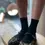 Thumbnail: Women wearing ankle length black socks and Mary Janes