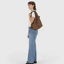 women holding leopard standard reusable shopping bag