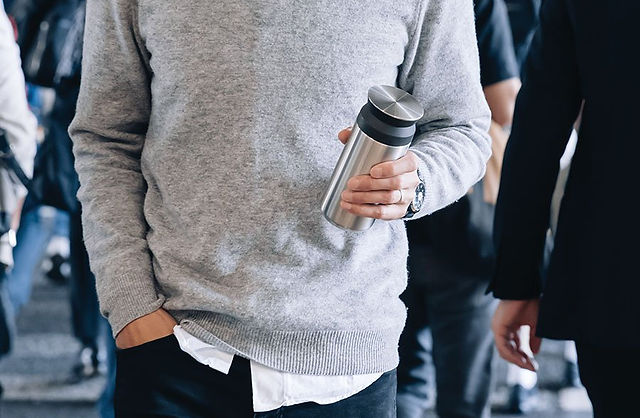 Japanese Kinto Travel tumbler drinks flask been carried by a commuter 