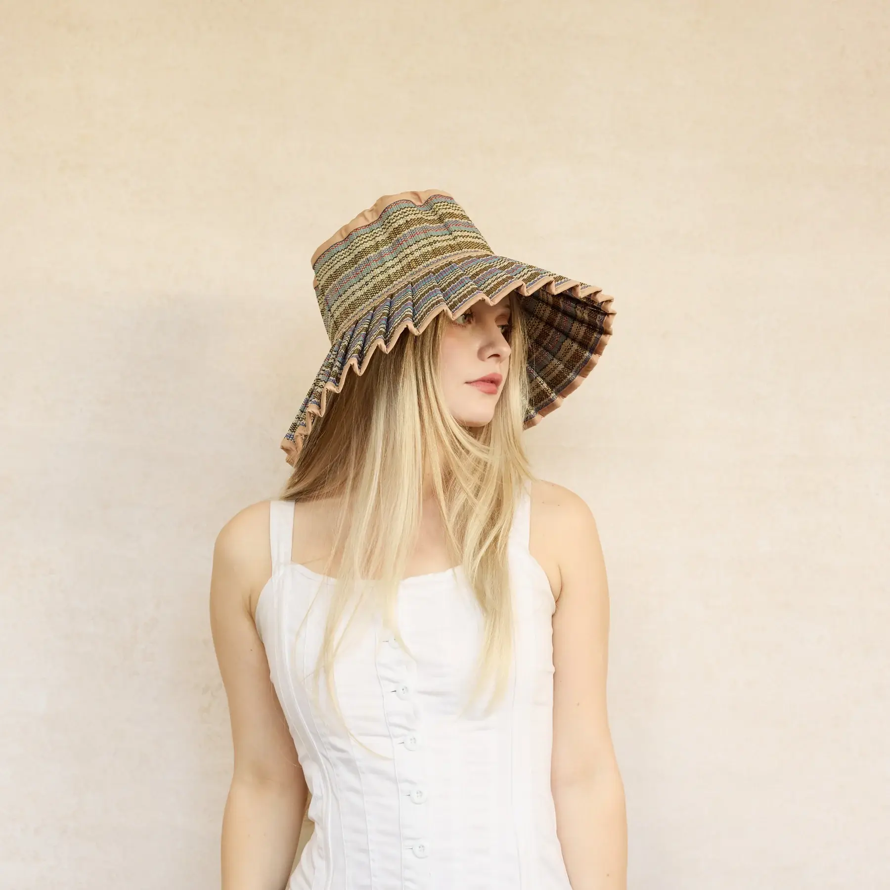 Women wearing Lorna Murray straw hat with silver thread
