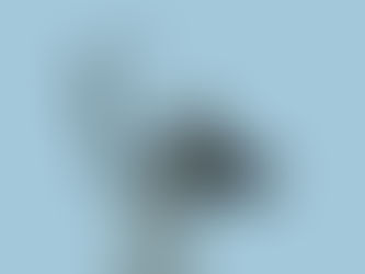 Statue of a woman releasing a bird into the sky, symbolizing letting go and releasing emotional burdens.