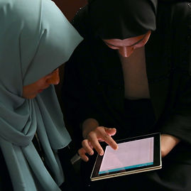 Two students looking at tablet.jpeg