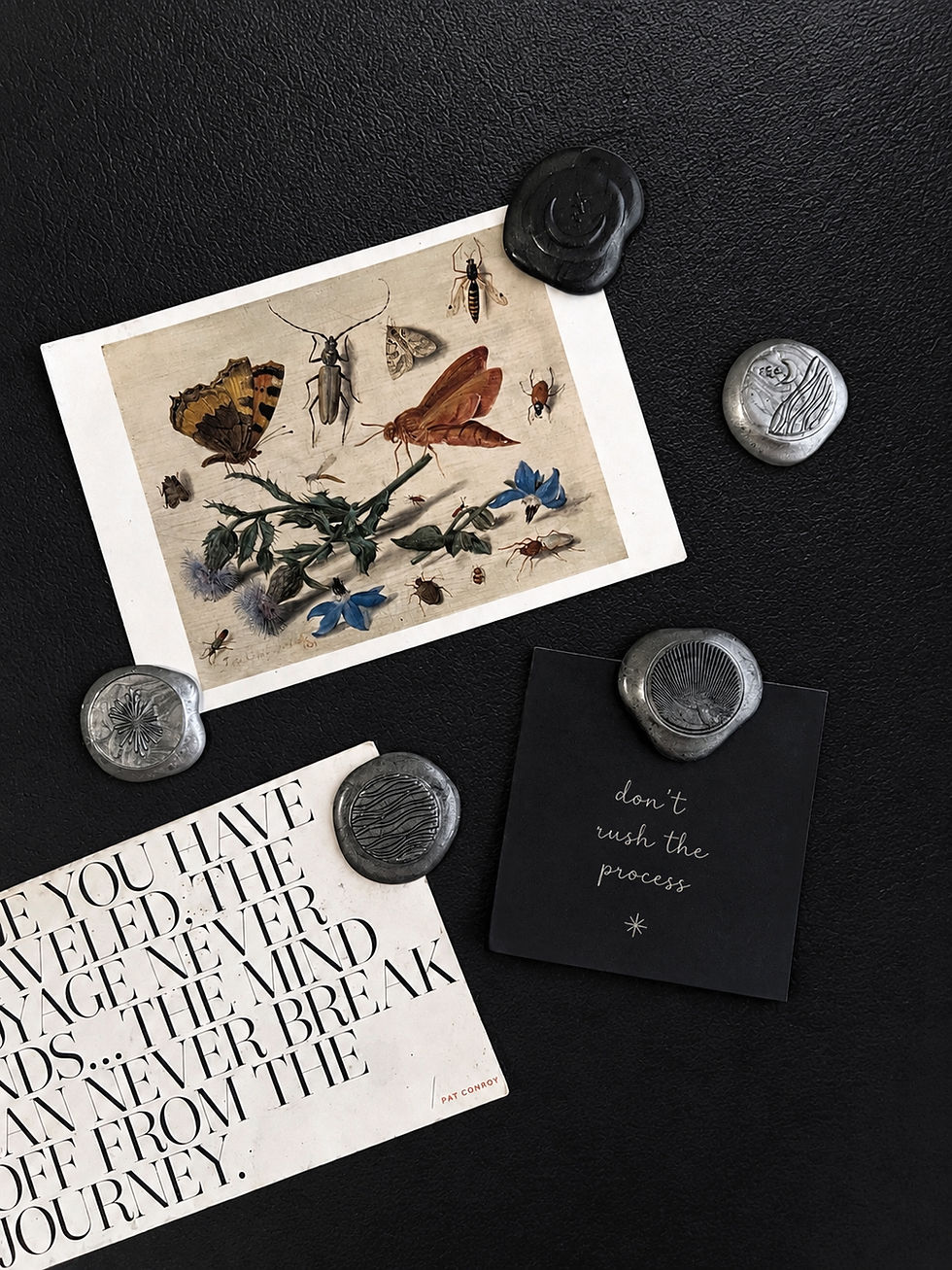 Moonwaves Wax Seal Magnets displayed with botanical prints and paper keepsakes.