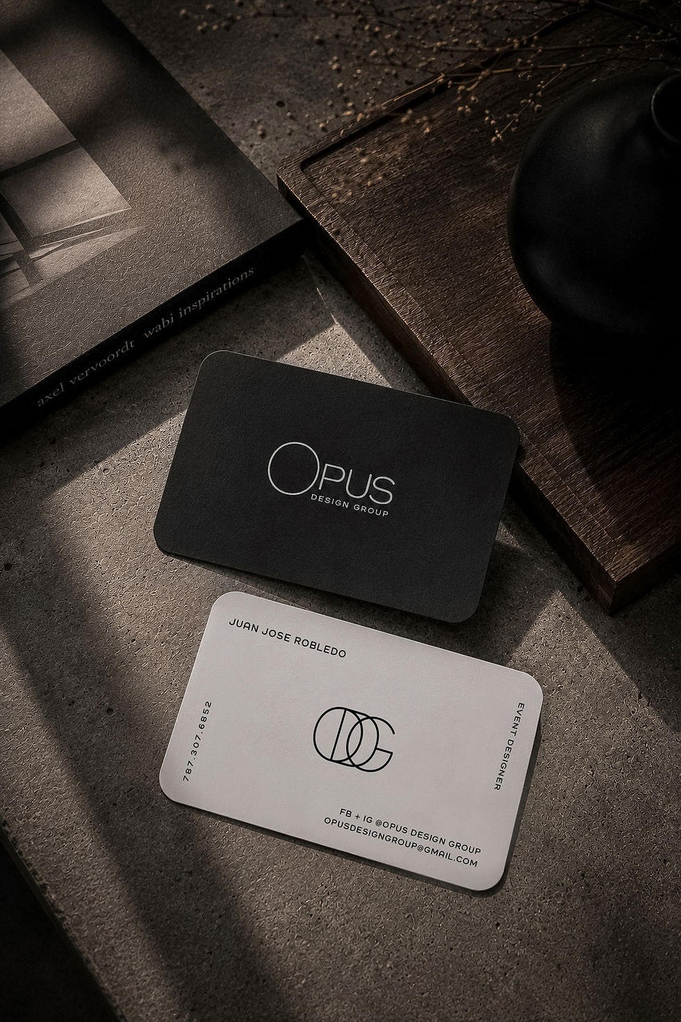 Luxury business card design for OPUS Design Group featuring monochromatic branding, elegant typography and refined editorial styling.