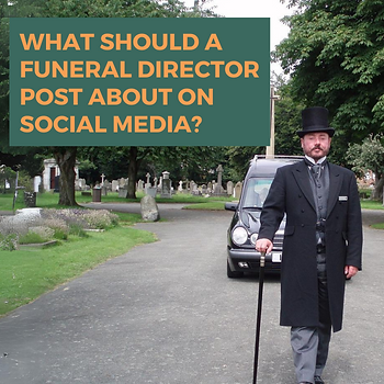 A funeral director walking in front of a hearse