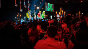 Tropicalia samba dancers and percussionists delivering a high-energy Brazilian performance on stage