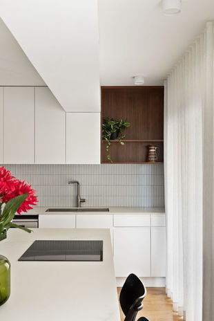 Modern kitchen interior with white cabinetry