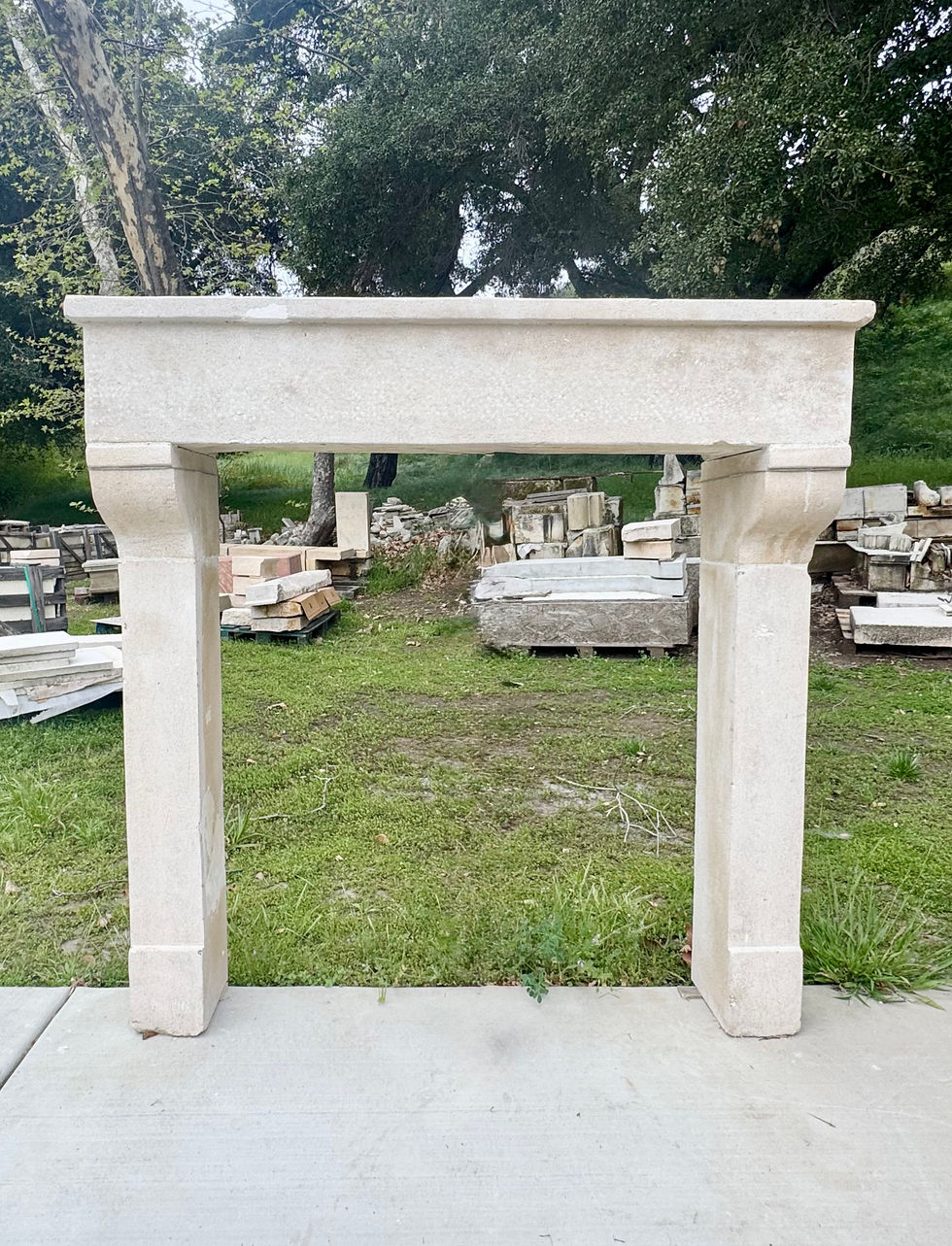 Antique French Limestone Fireplace at Charme D'Antan