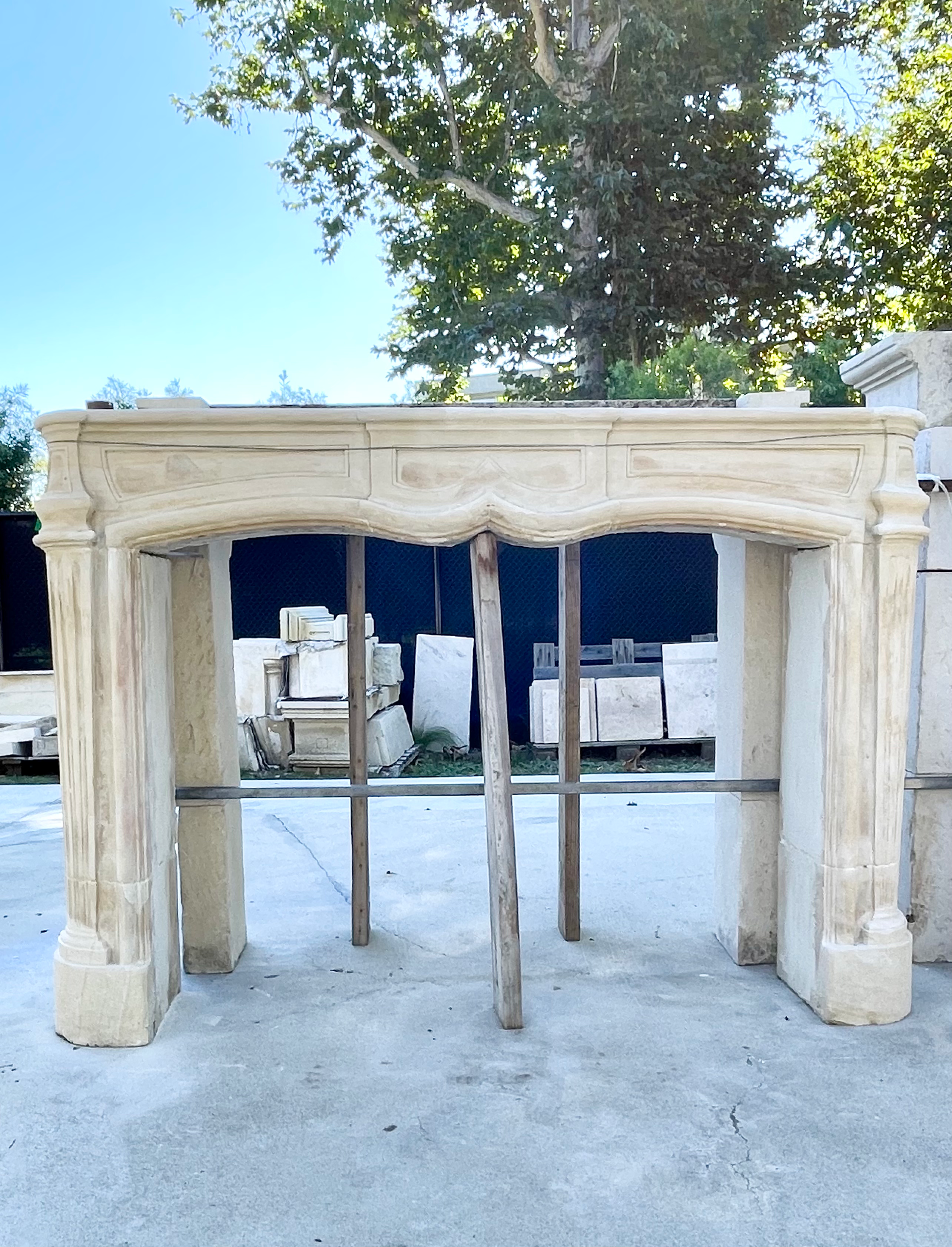 Antique French Limestone Fireplace at CHarme D'Antan