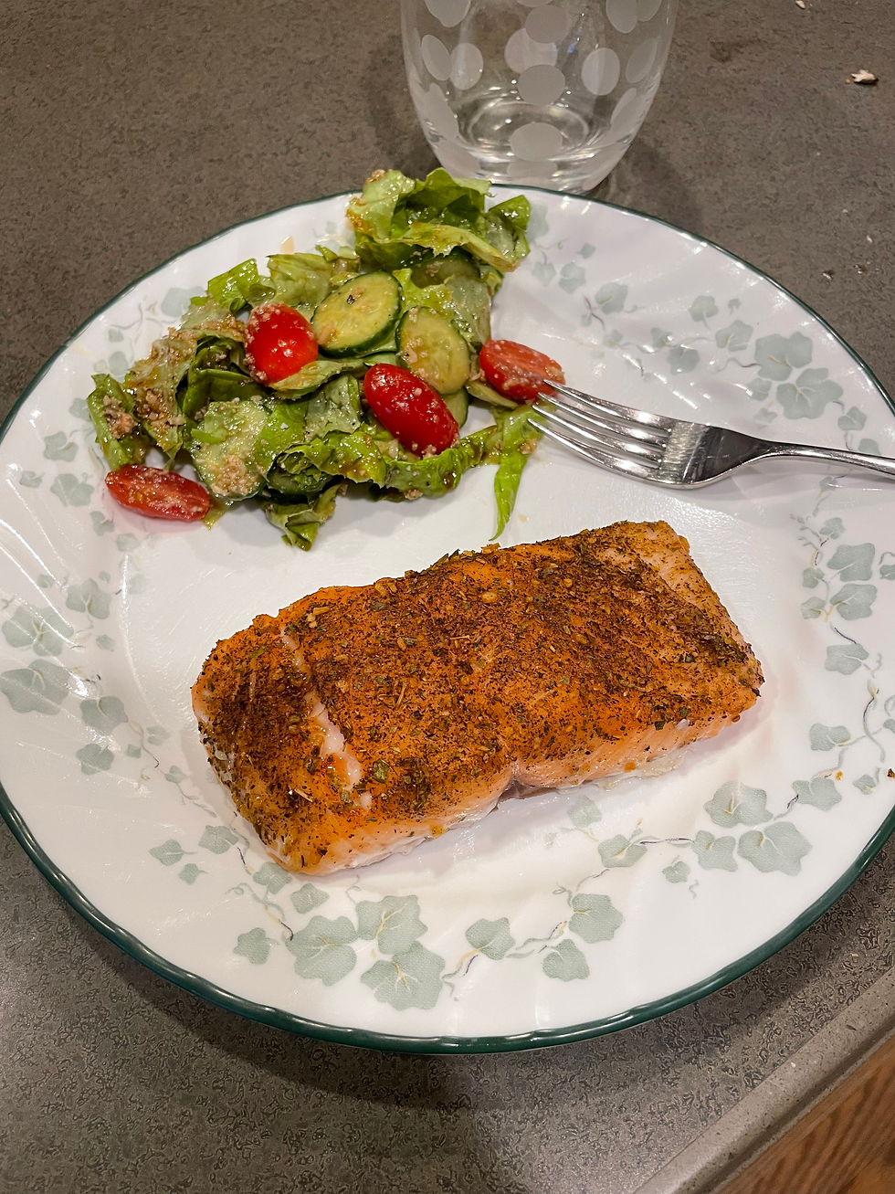 salmon and salad on a plate