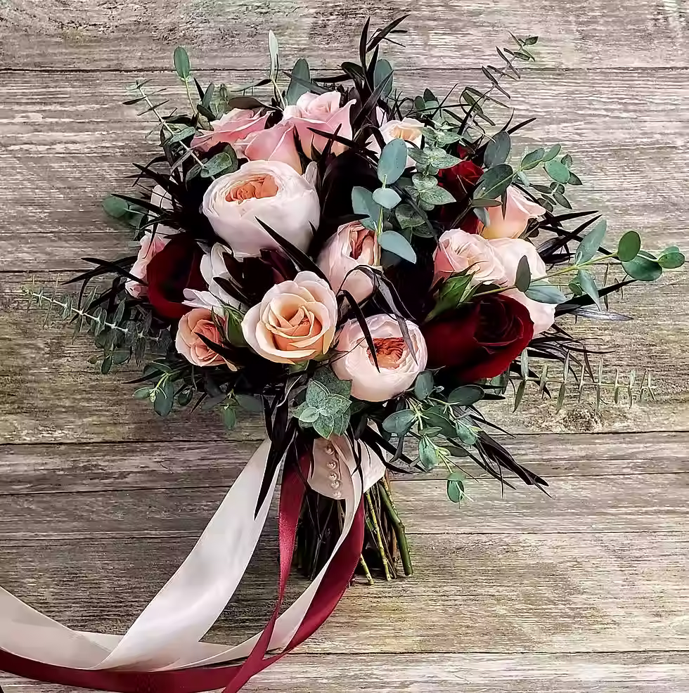 Price: $225.00 
A perfect mix of roses, garden roses, spray roses, safari sunset, agonis (seasonal), and a variety of eucalyptus.