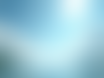 Eye-level view of a bright summer sky with scattered clouds and a shining sun