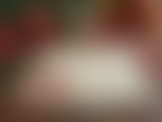 Close-up view of a handmade Christmas card with festive decorations