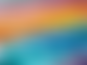 Close-up view of a vibrant watercolor palette showcasing different hues