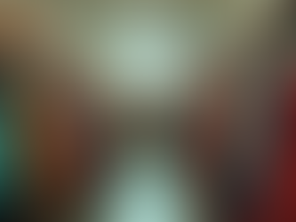 Eye-level view of a vibrant thrift store filled with colorful clothing