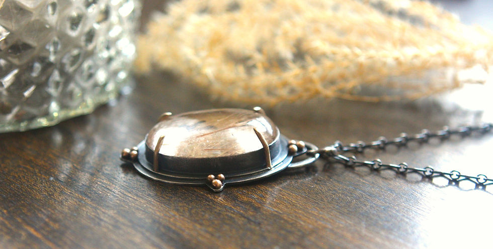 Thumbnail: Rutilated Quartz Placed Over Stylized Tree and Set In Layered Silver and 14K