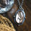 Thumbnail: Rutilated Quartz Placed Over Stylized Tree and Set In Layered Silver and 14K