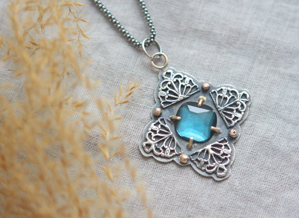 Thumbnail: Deep Sea Blue Topaz Set In Filigree Silver and 14K Gold w/ Sterling Chain