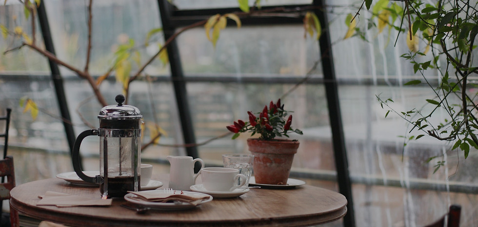 Coffee table in front of of a window_edi