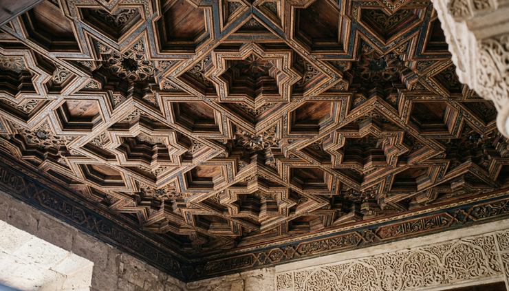 Close-up view of a Mudéjar coffered ceiling inside Belmonte Castle