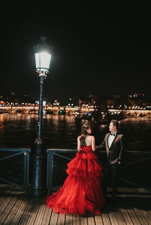 View of the Louvre from Pont des Arts, a best Paris photo spot.