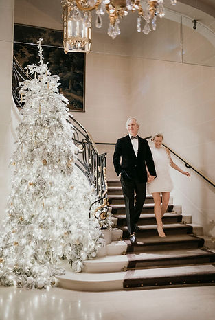 paris hotel elopement elegant couple walk down the stairs