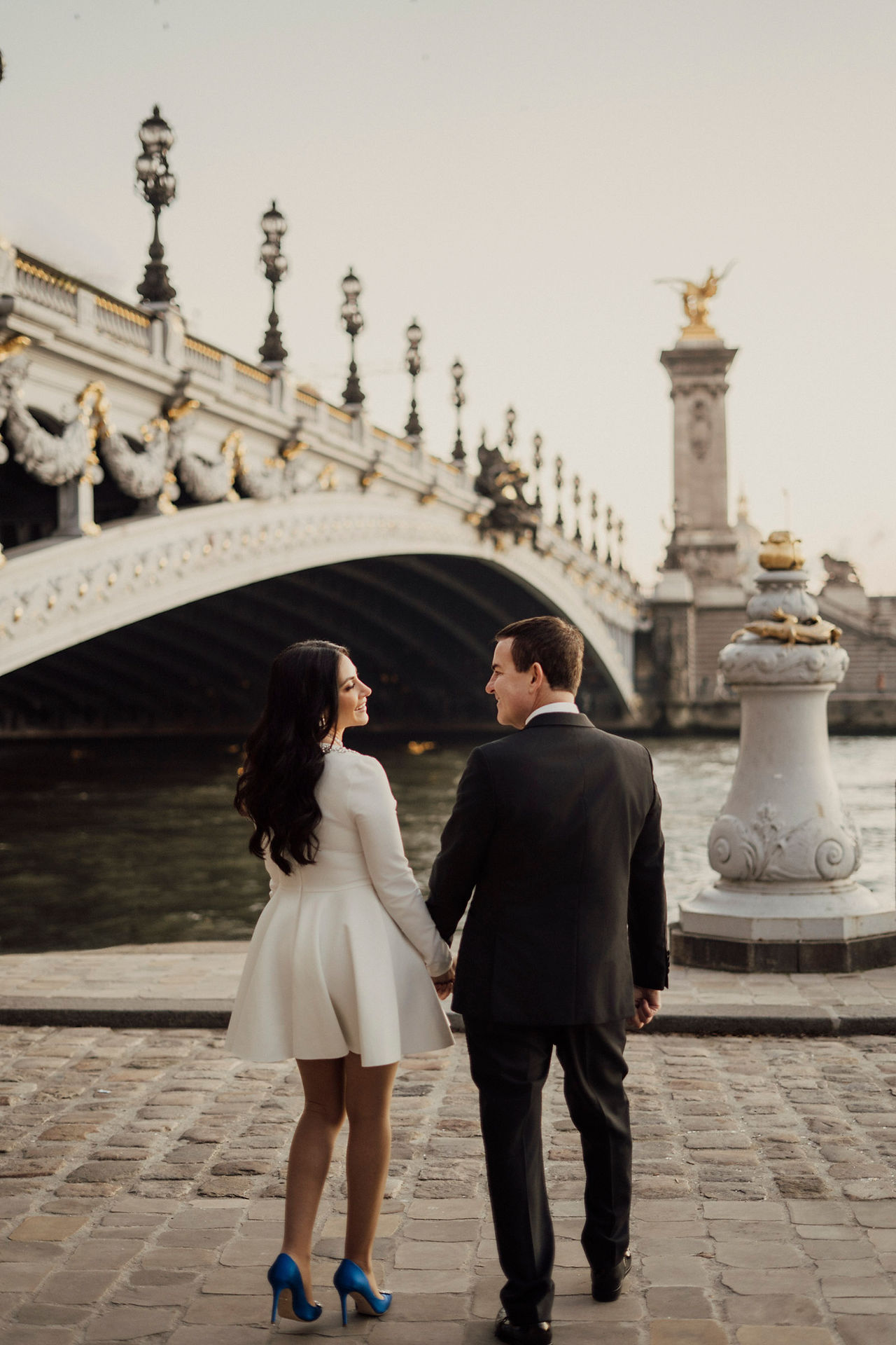 Paris winter elopement portraits at Pont Alexandre III with golden bridge details