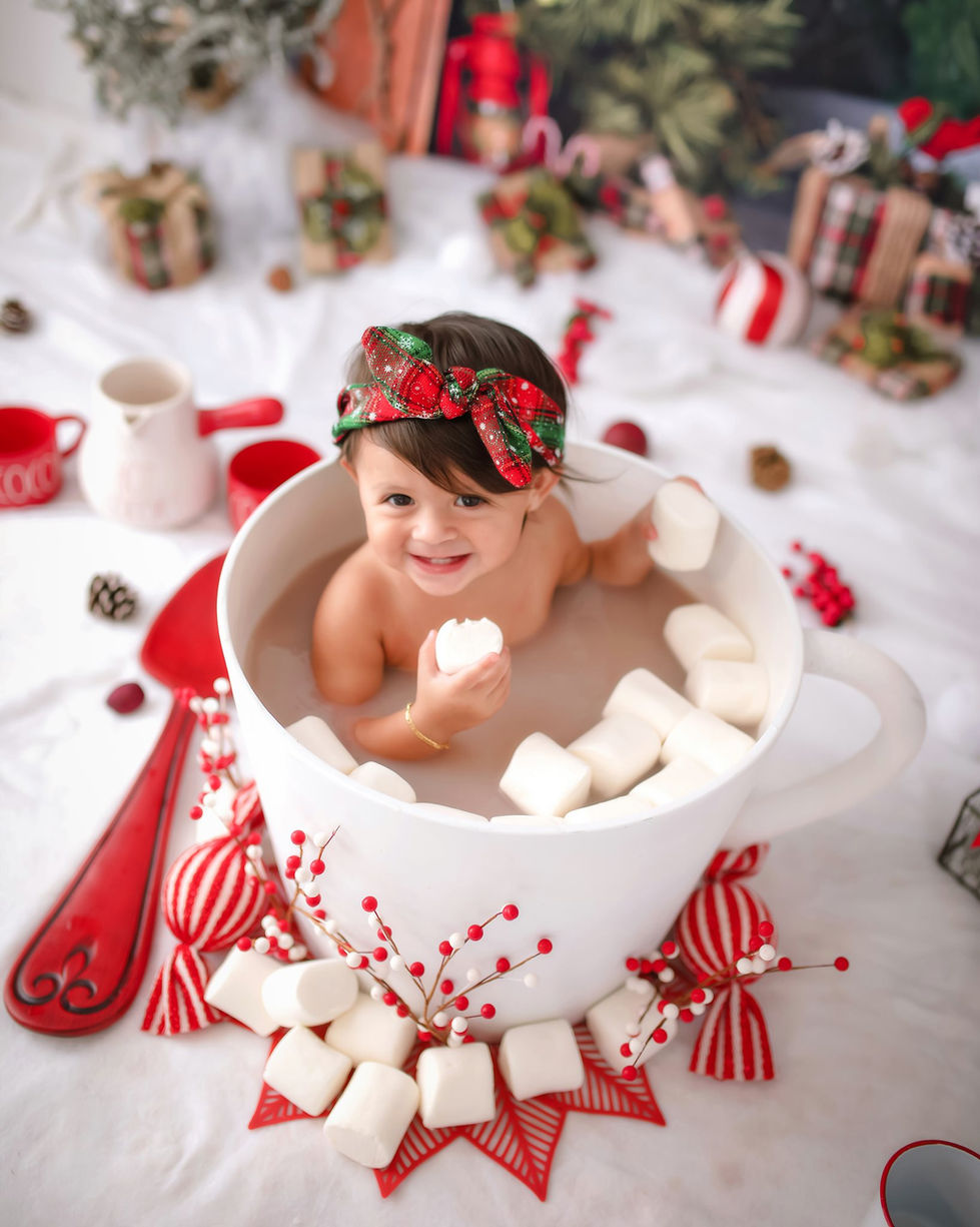 Christmas hot cocoa stand milk bath with marshmallows and holiday props at Shutter Swan Studios in Lakeland, FL.