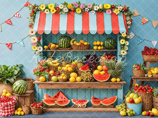 Colorful fruit stand photo backdrop with watermelon, citrus, strawberries, and summer decorations at Shutter Swan Studios in Lakeland, FL