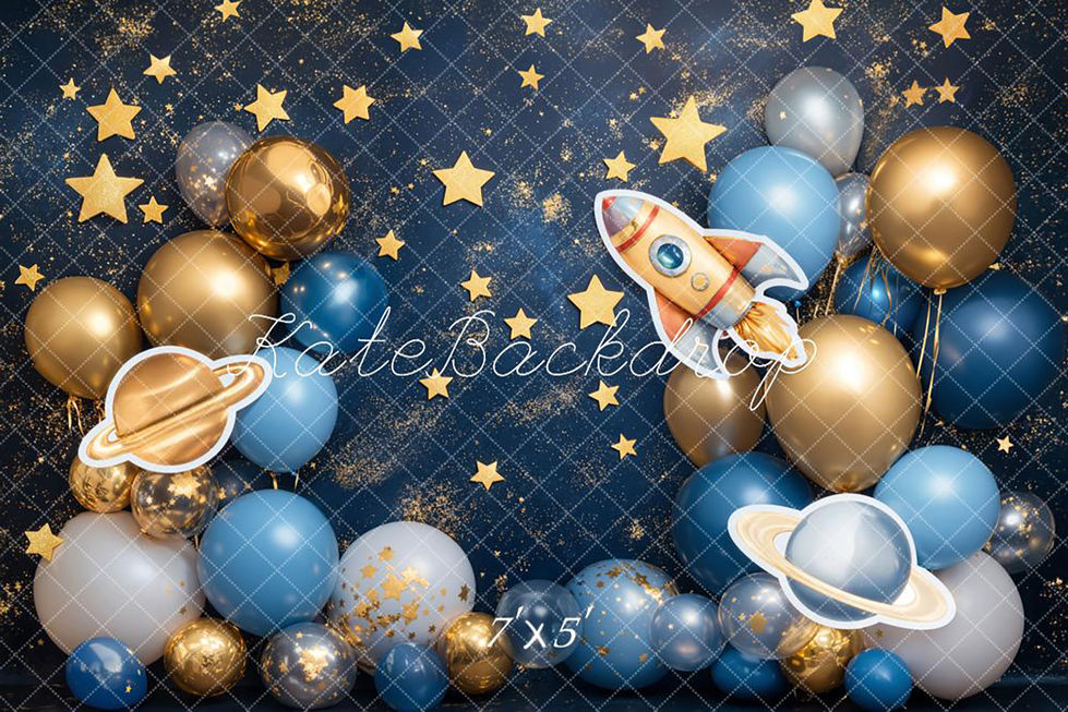 Space-themed photo backdrop with golden stars, planets, rocket, and blue/gold balloon garland at Shutter Swan Studios in Lakeland, FL.