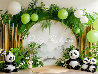 Bamboo forest and panda-themed backdrop with plush panda bears, green foliage, and balloons – ideal for first birthday and milestone photography.